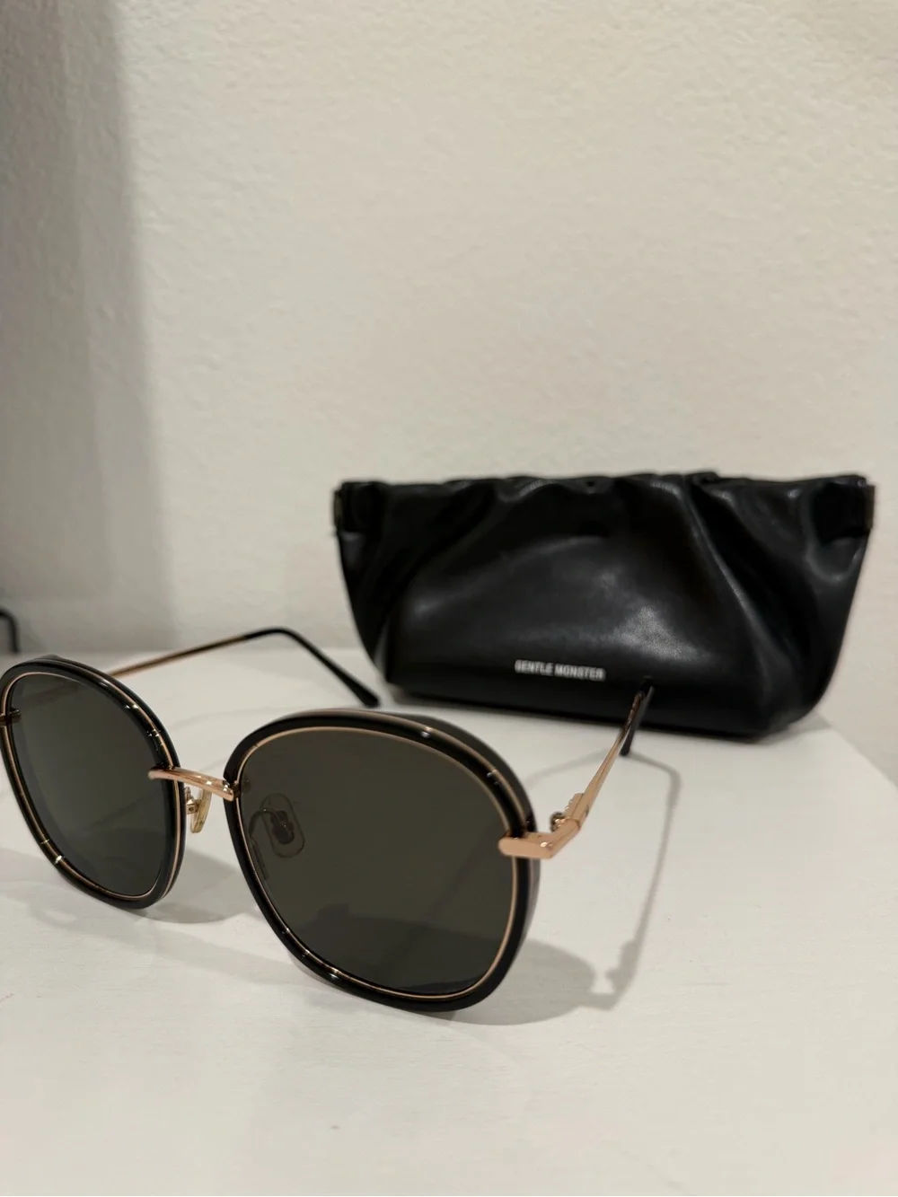 GENTLE MONSTER Black and Gold Round Sunglasses